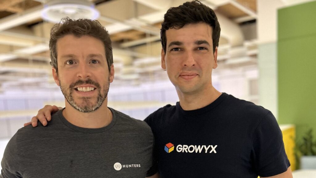 Felipe Mollica, fundador da 99hunters, e João Paulo Araújo, cofundador da Growyx e CEO da Hunterhero. Crédito: Divulgação.